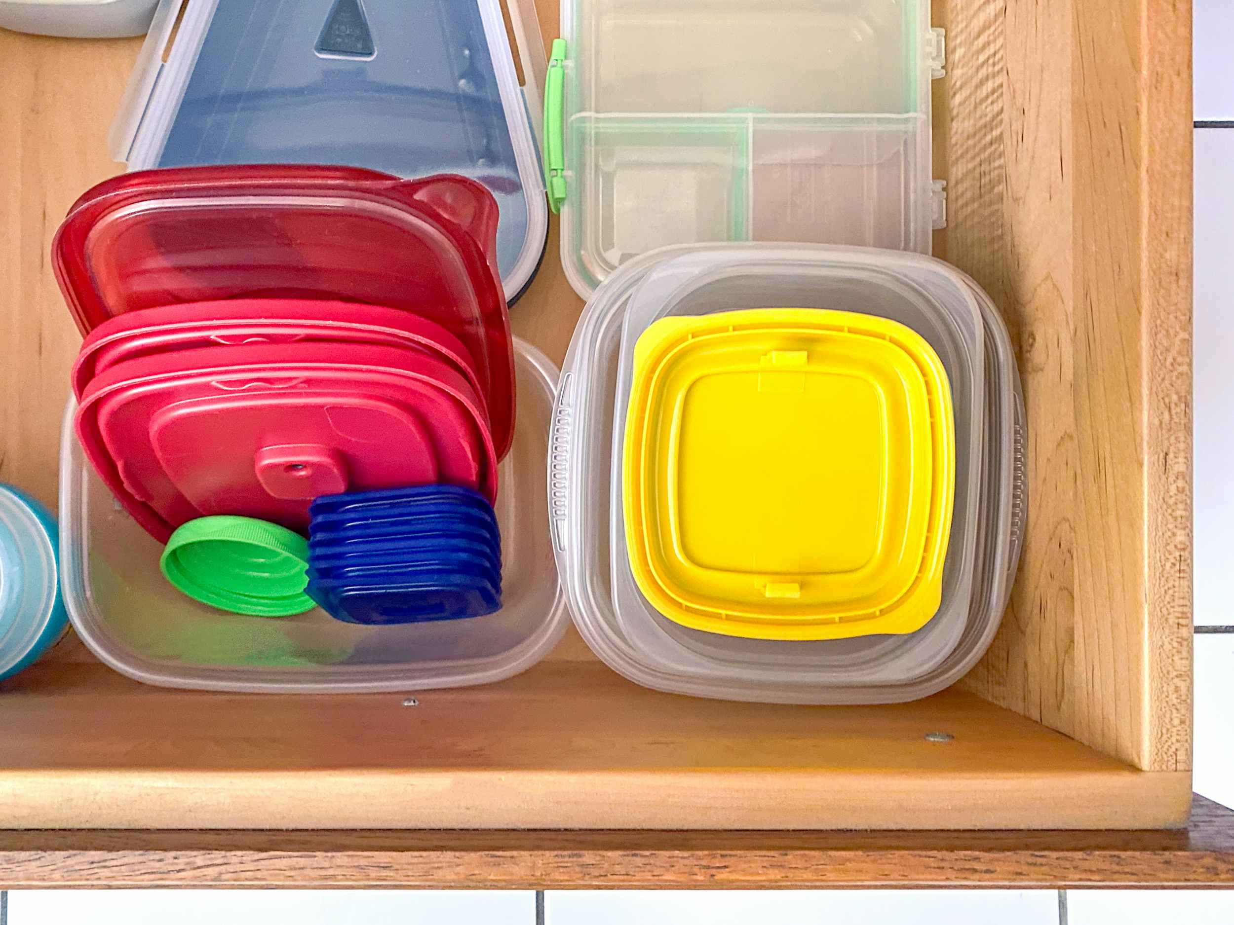 kitchen tupperware containers nested inside one another in drawer