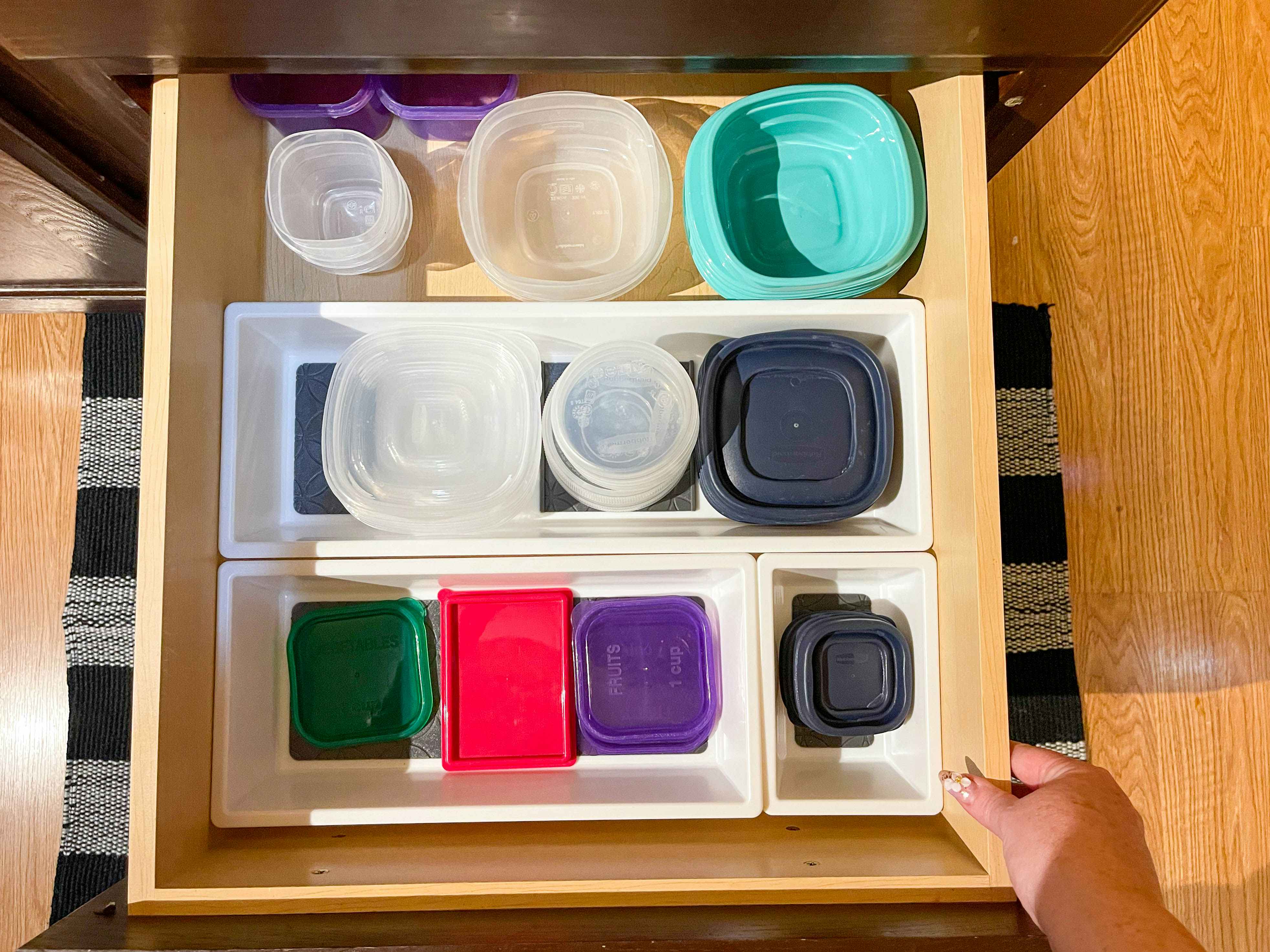 tupperware organized in drawer