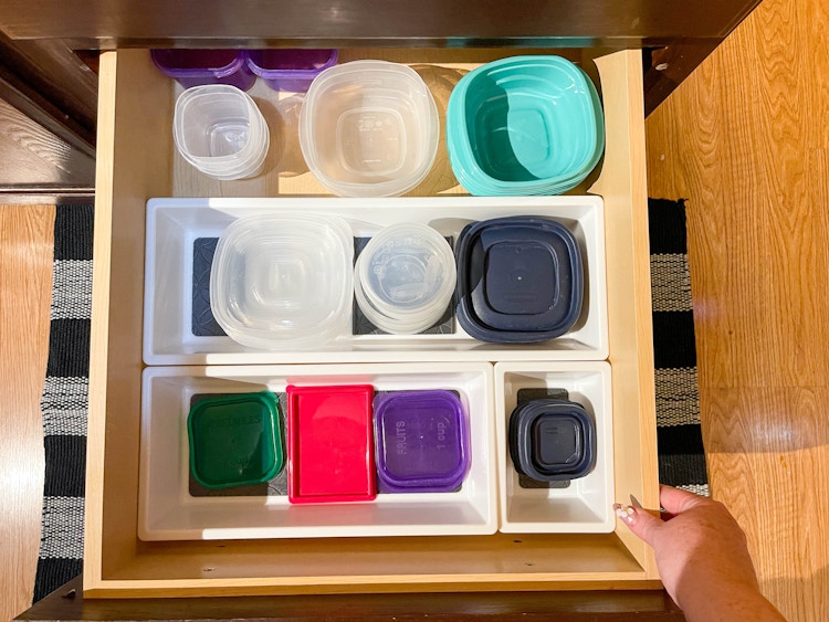 tupperware organized in drawer