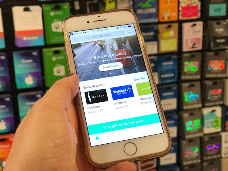 phone showing raise.com app