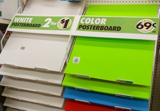 A display of white and colorful poster boards at Dollar Tree. 