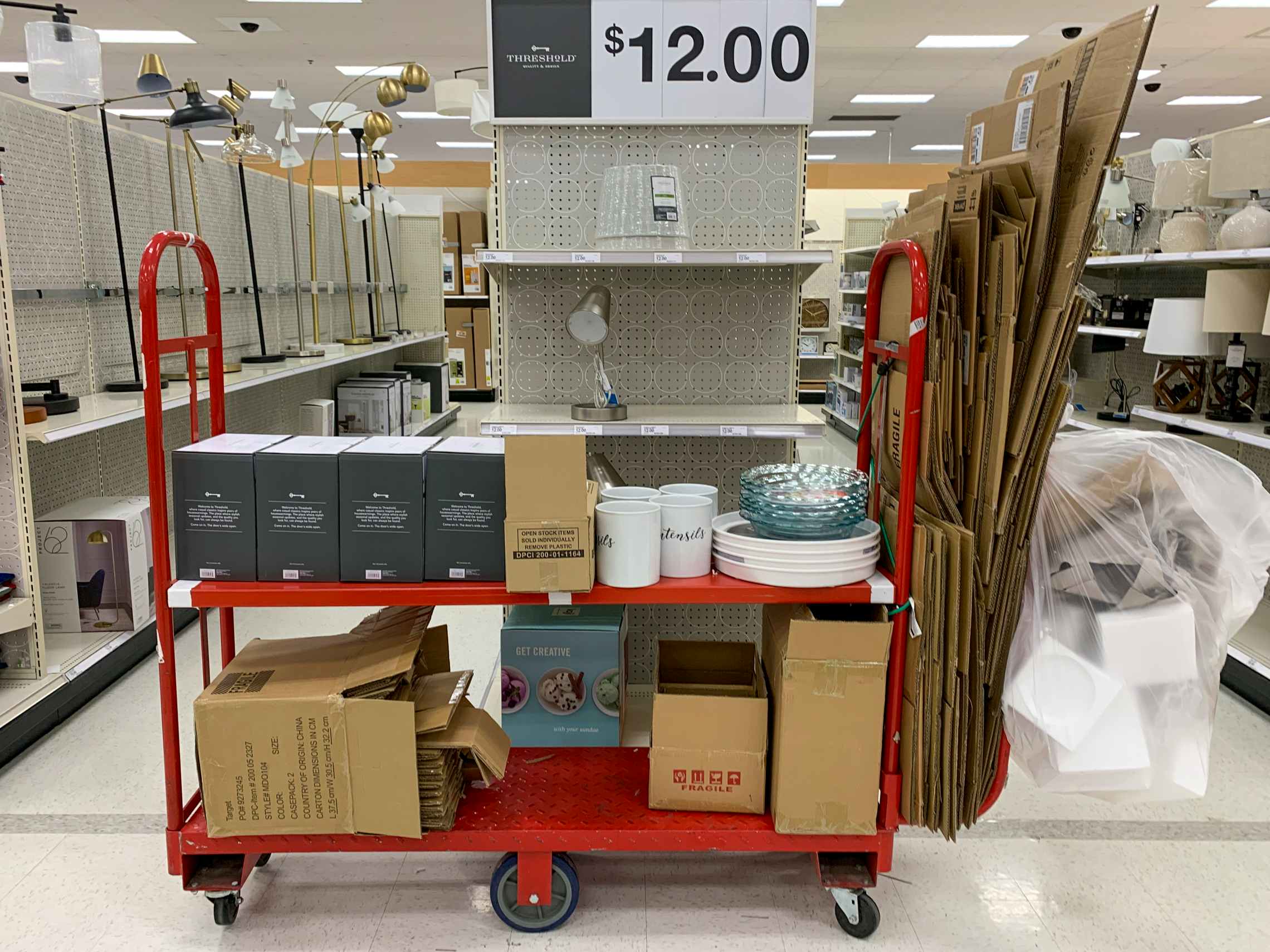 Cardboard boxes on a cart inside Target.