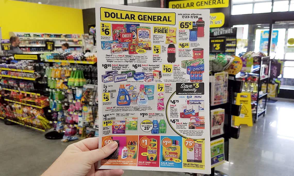 woman holding dollar general weekly ad in store