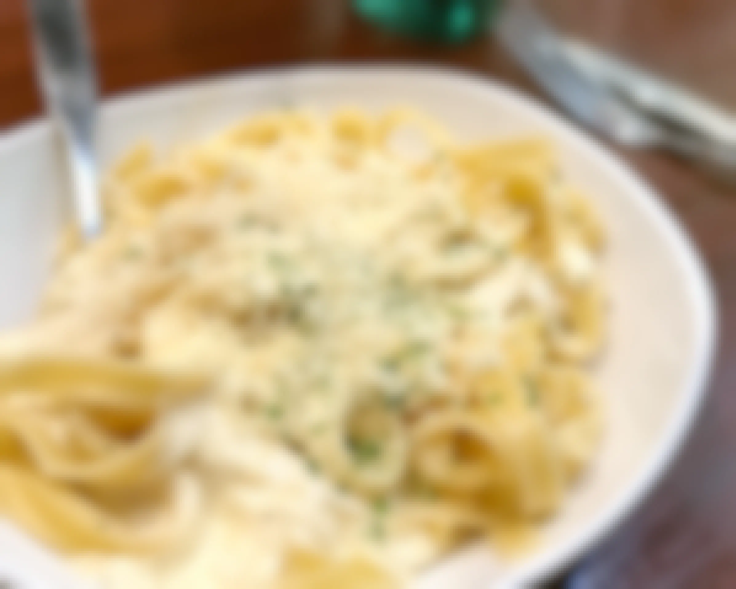 A close-up on a bowl of pasta from Olive Garden.