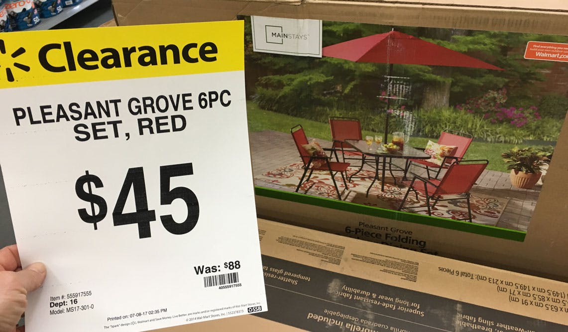 Buy patio furniture at Walmart when prices drop in July.