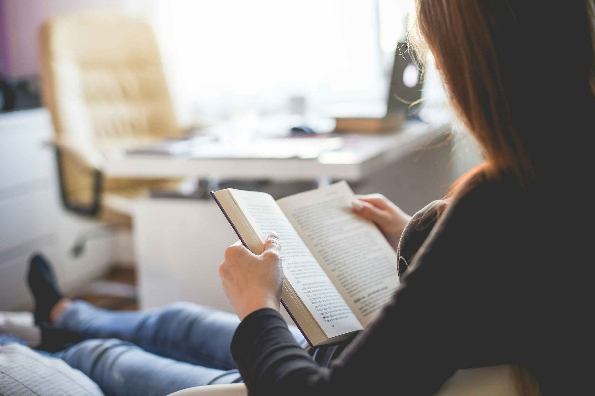 A person reading a book.