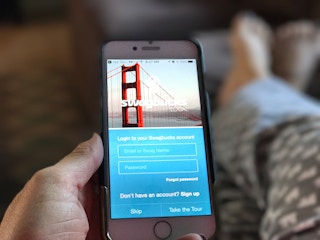 hand holding cellphone with swagbucks