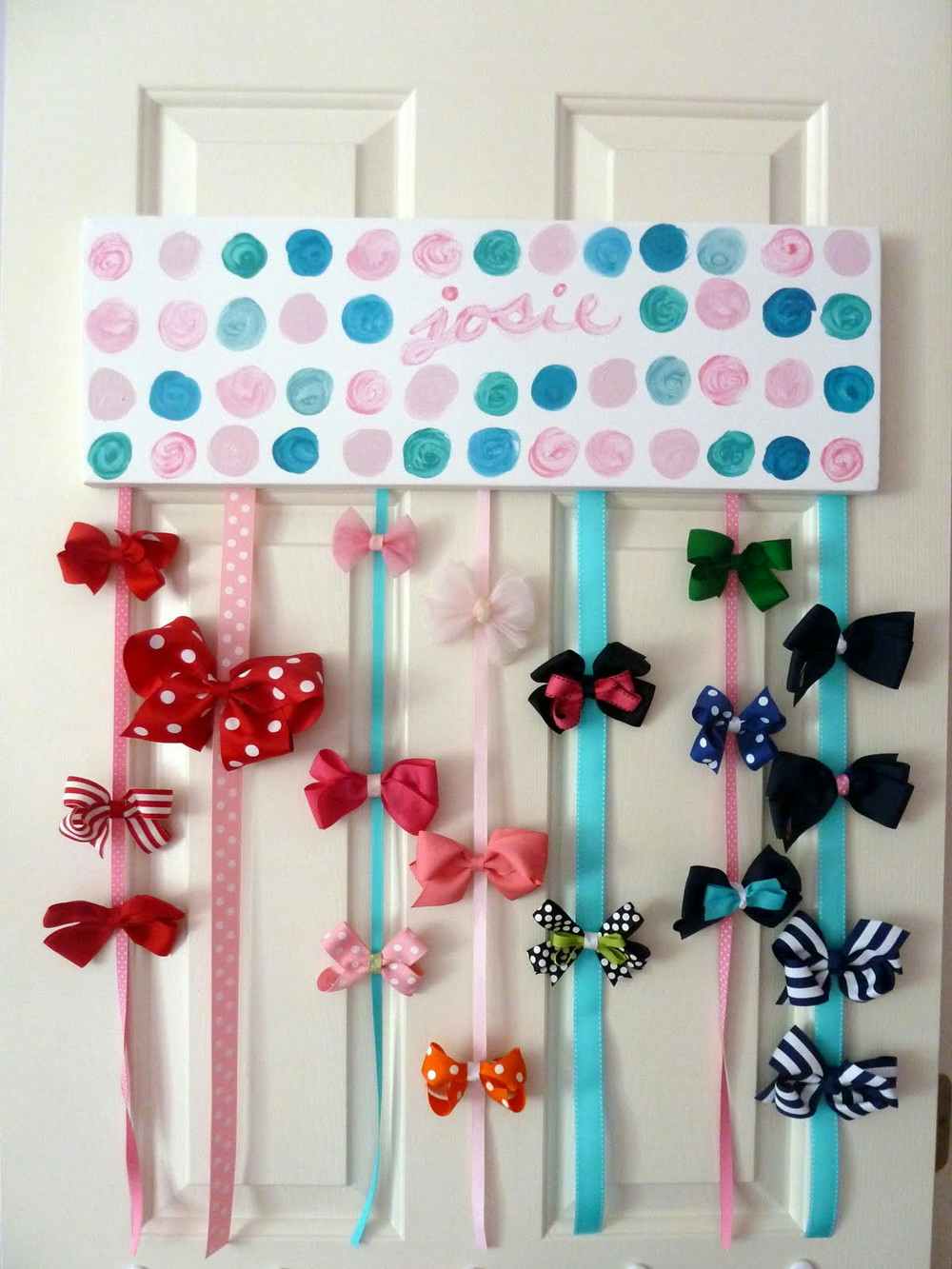 Keep clips and bows organized with hanging ribbons.