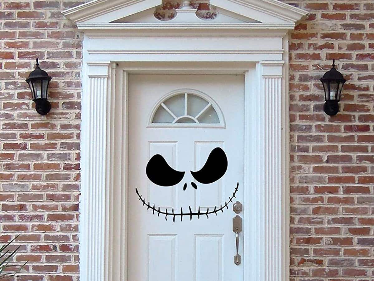 A front door decorated to look like Jack Skellington from A Nightmare before Christmas.