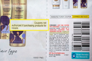 A Pantene bottle next to a Pantene manufacture coupon