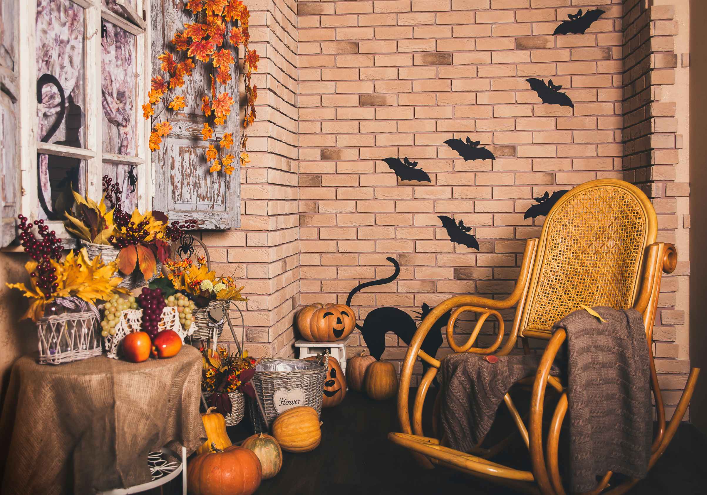 A front porch decorated for Halloween.