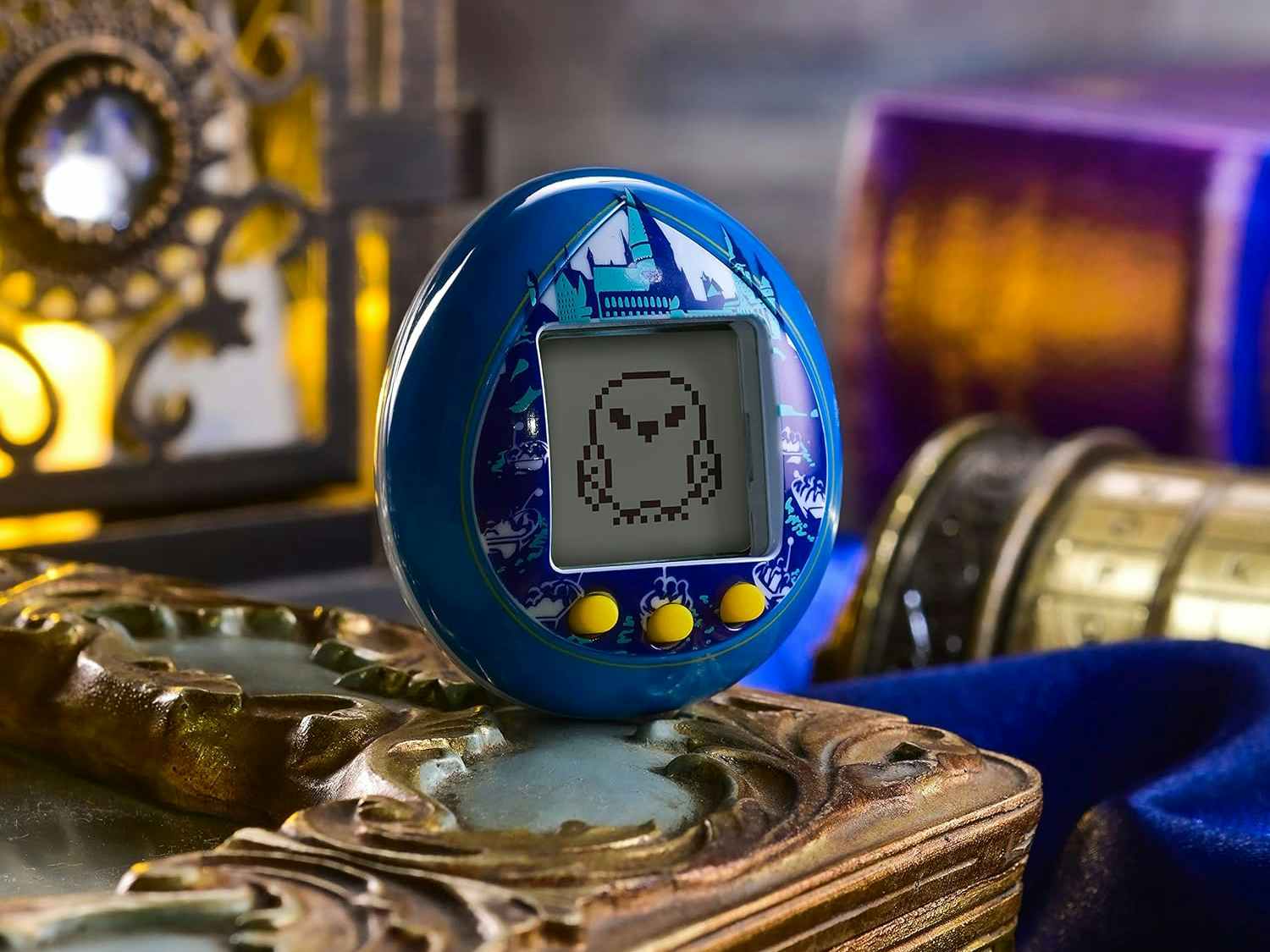 a tamagotchi with the Harry Potter castle and an owl pet