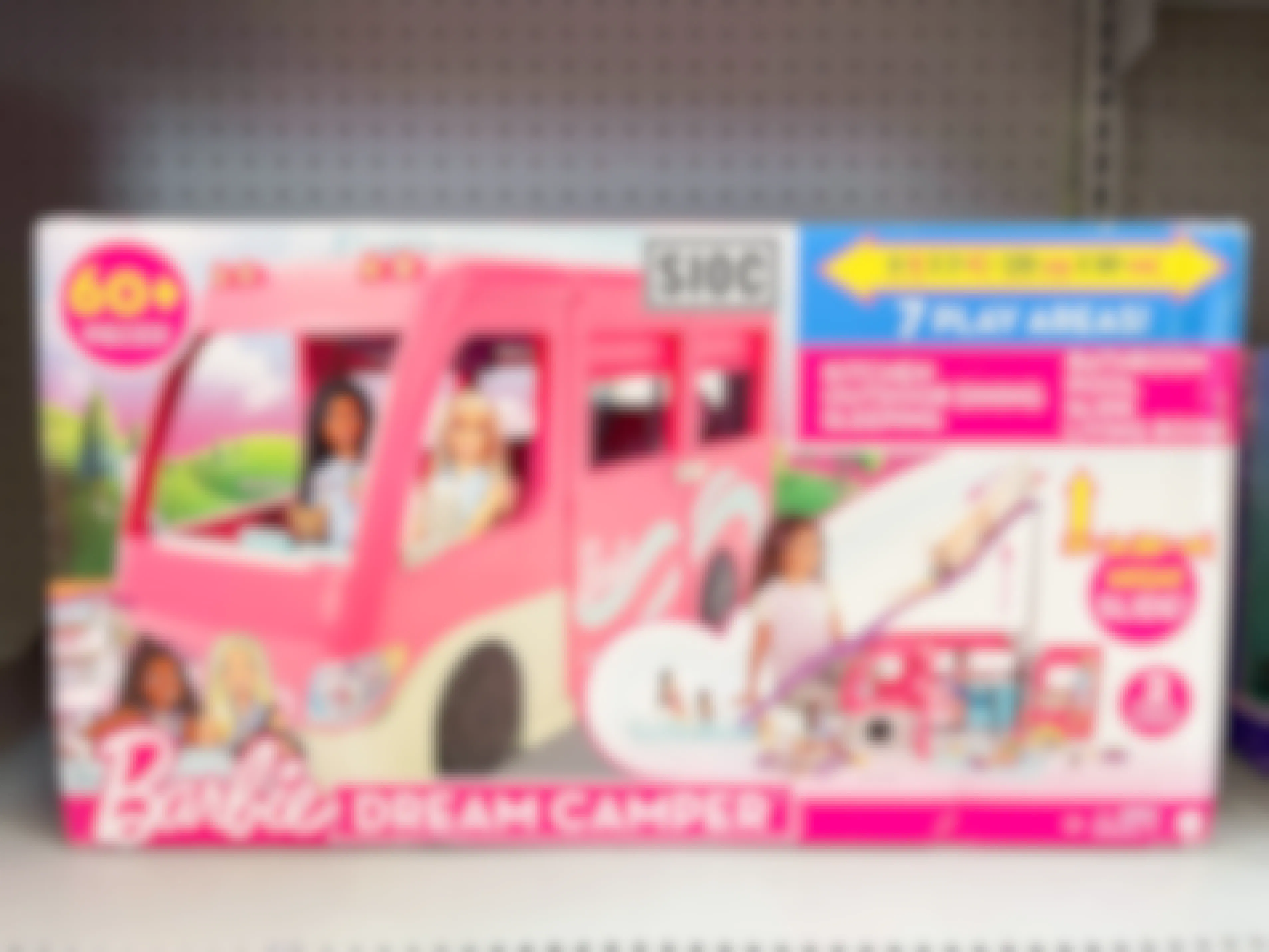 A Barbie DreamCamper set on a shelf.