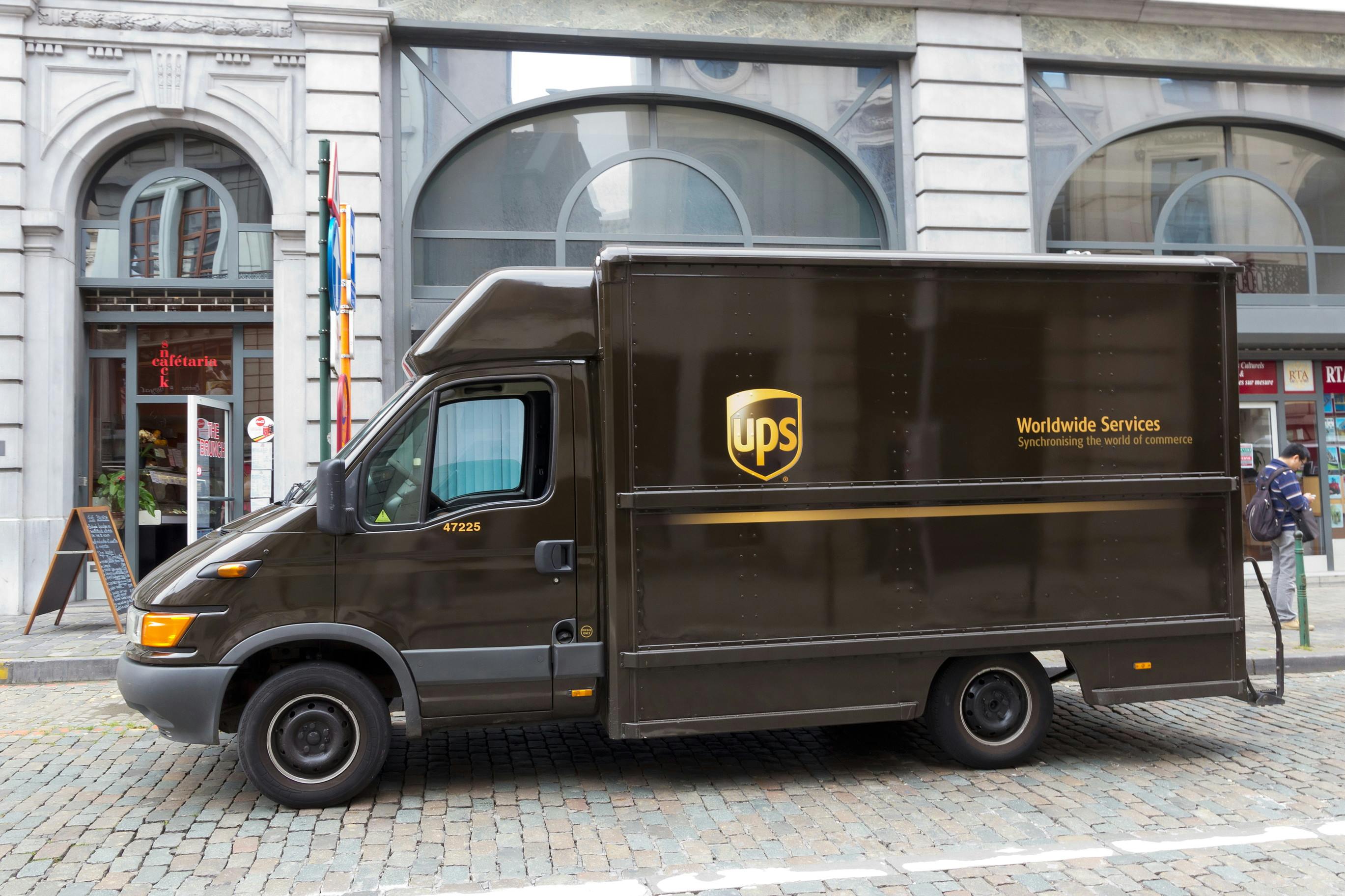 Image of a parked UPS truck in front of a store