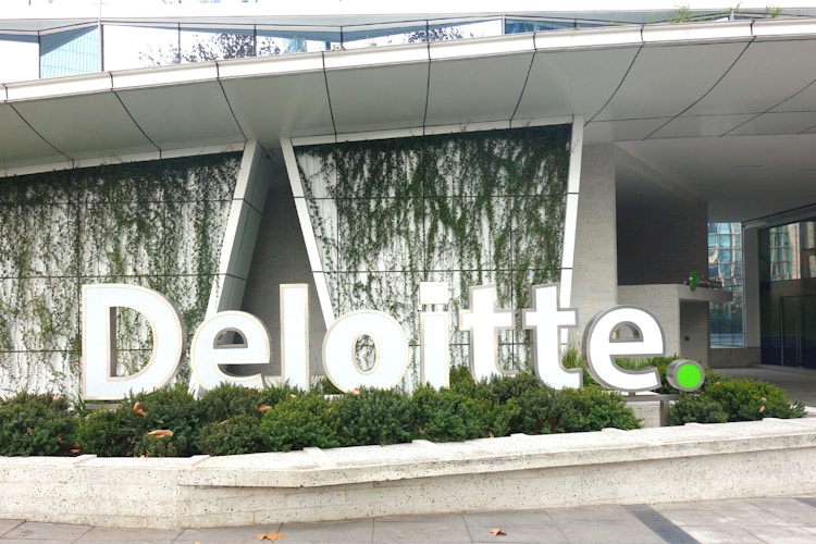 The Deloitte sign in front of their building