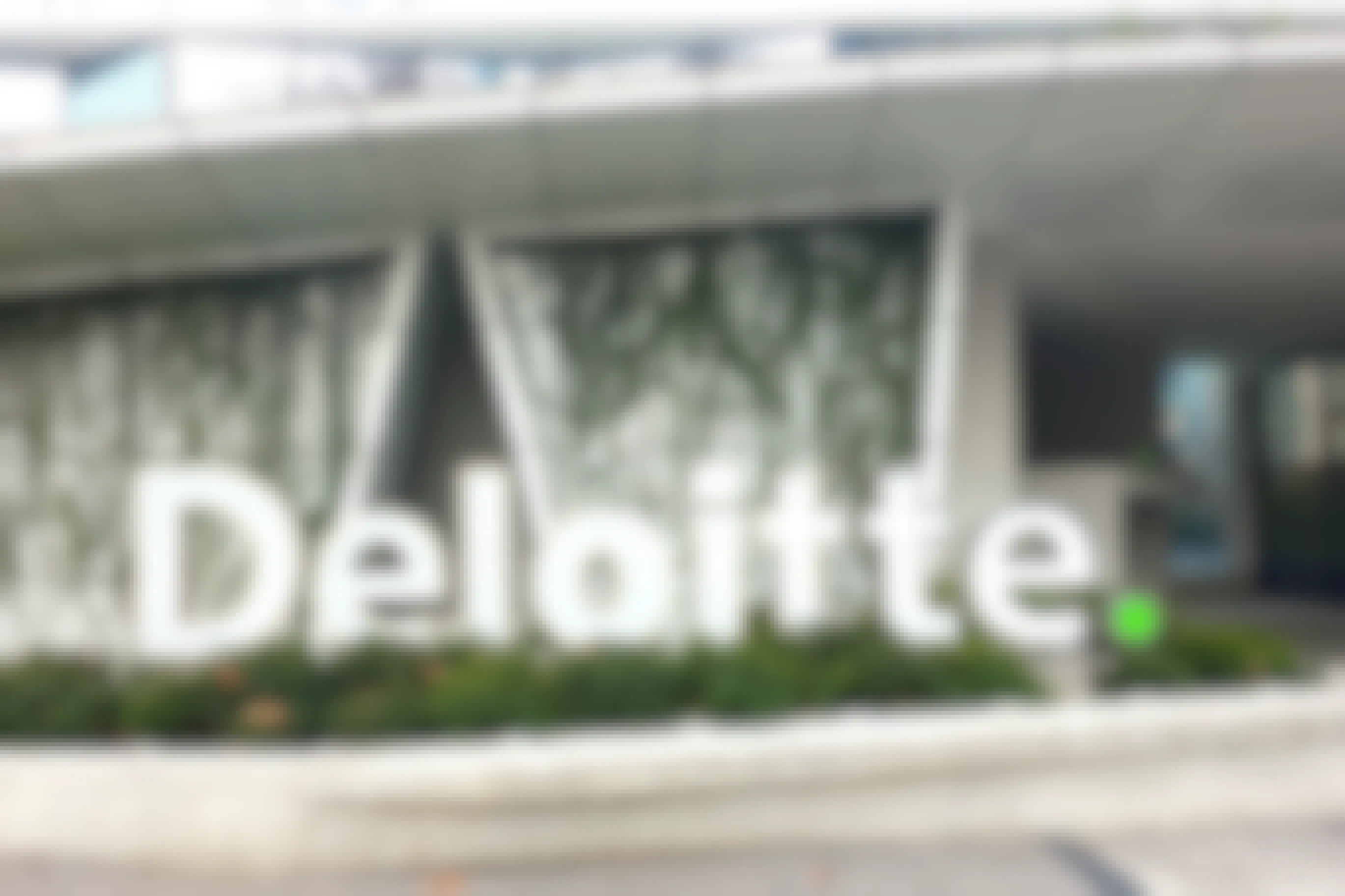 The Deloitte sign in front of their building