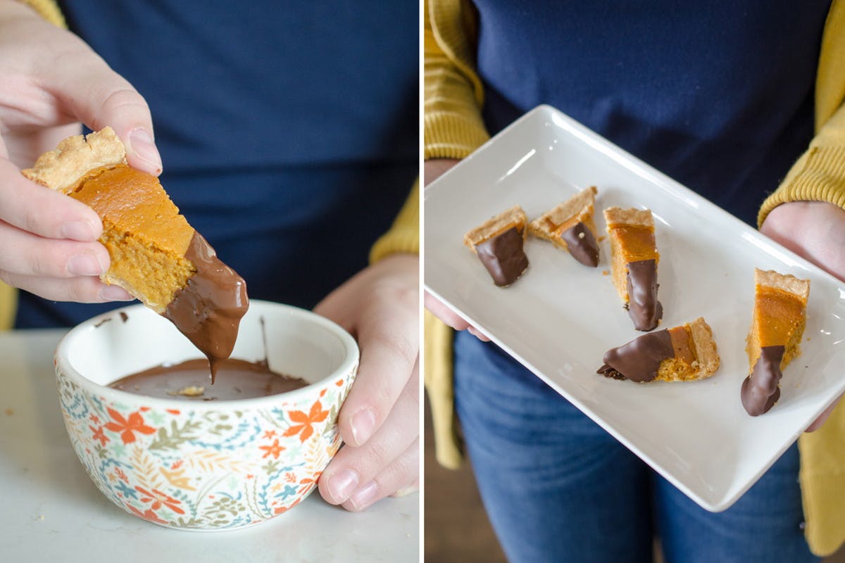 A person dipping a piece of pumpkin pie into a bowl of melted chocolate, and holding a platter of some chocolate-dipped pieces.