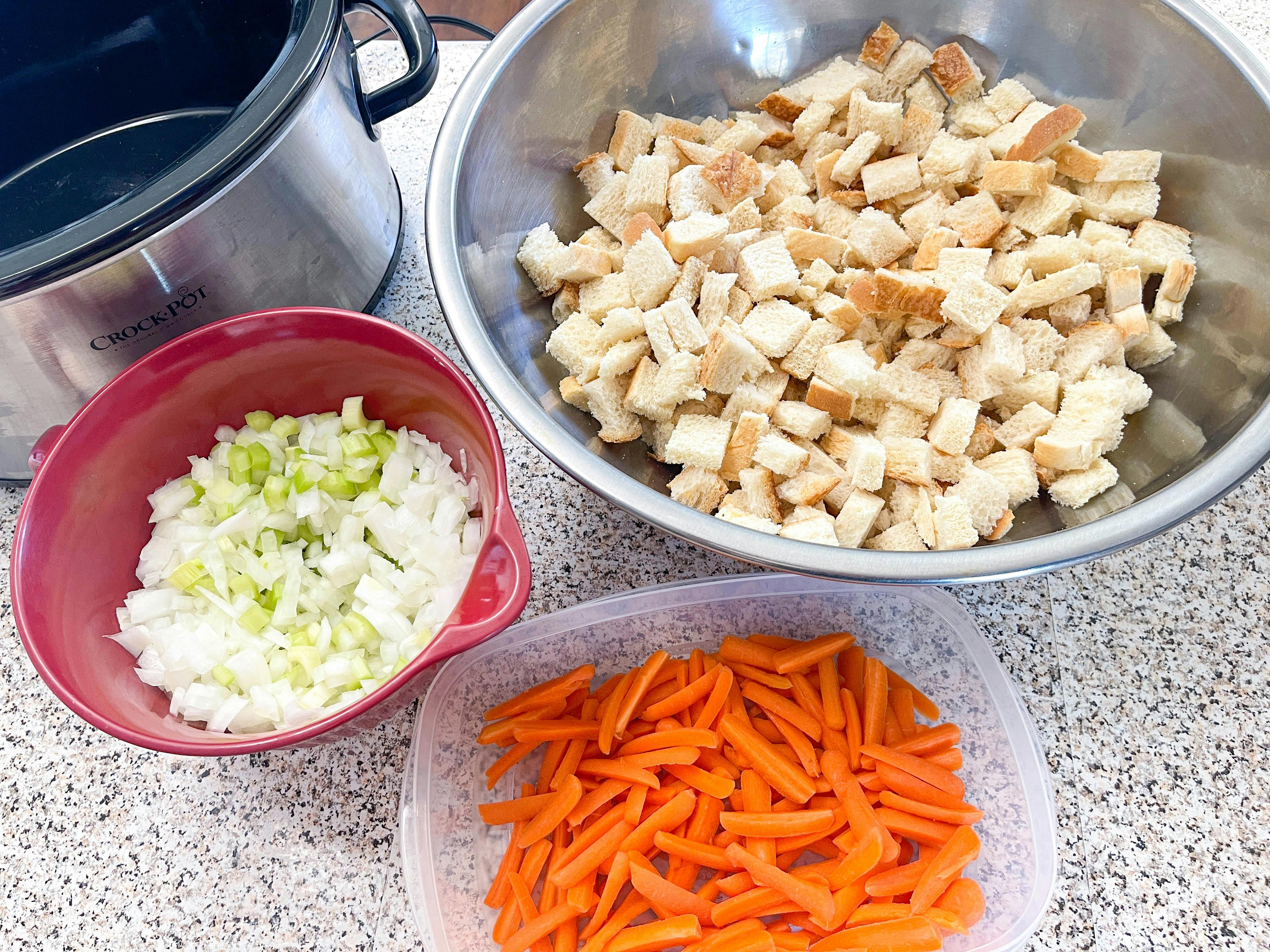 Ingredients for stuffing on the side of a slow cooker