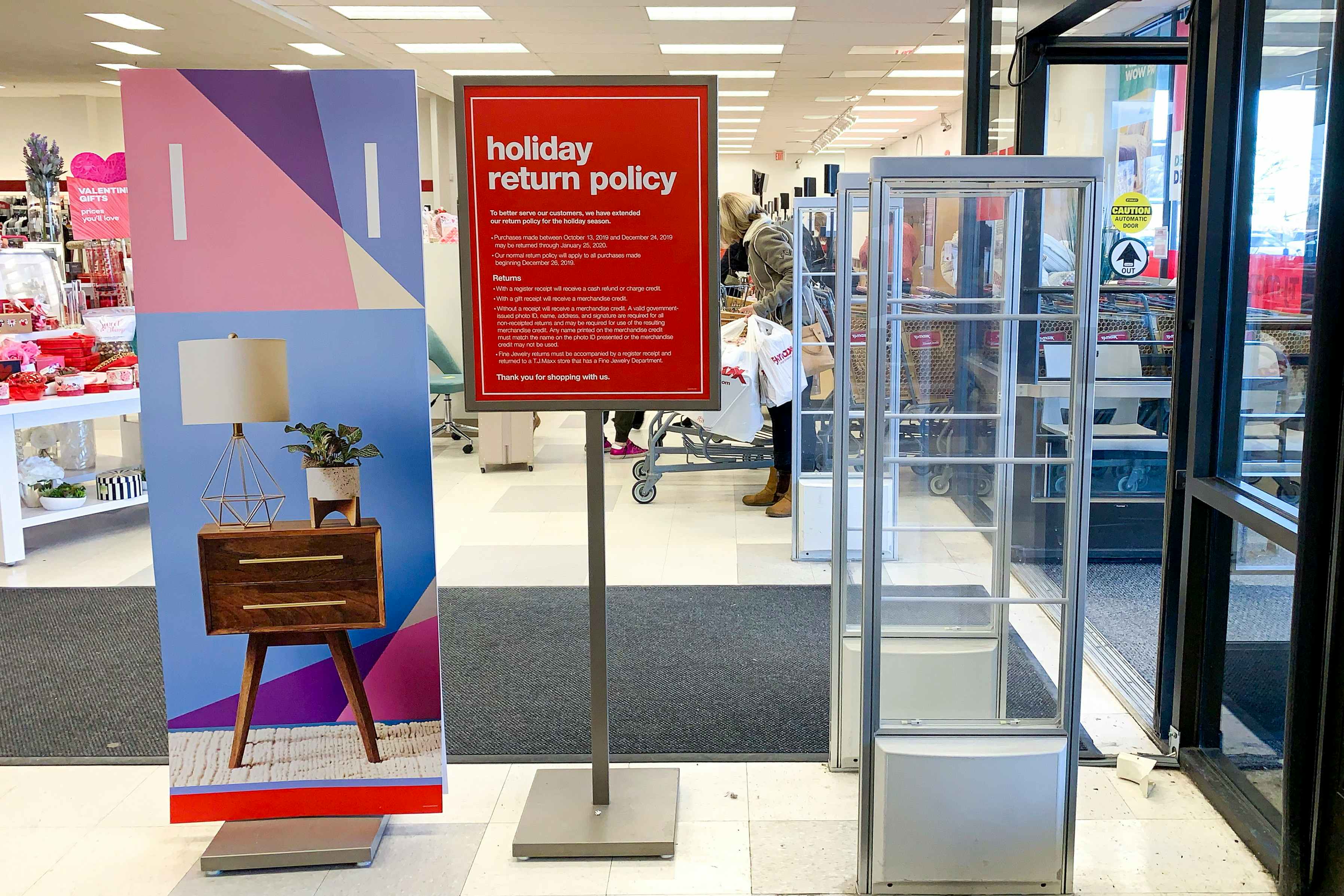 The holiday return policy sign at the front entrance.