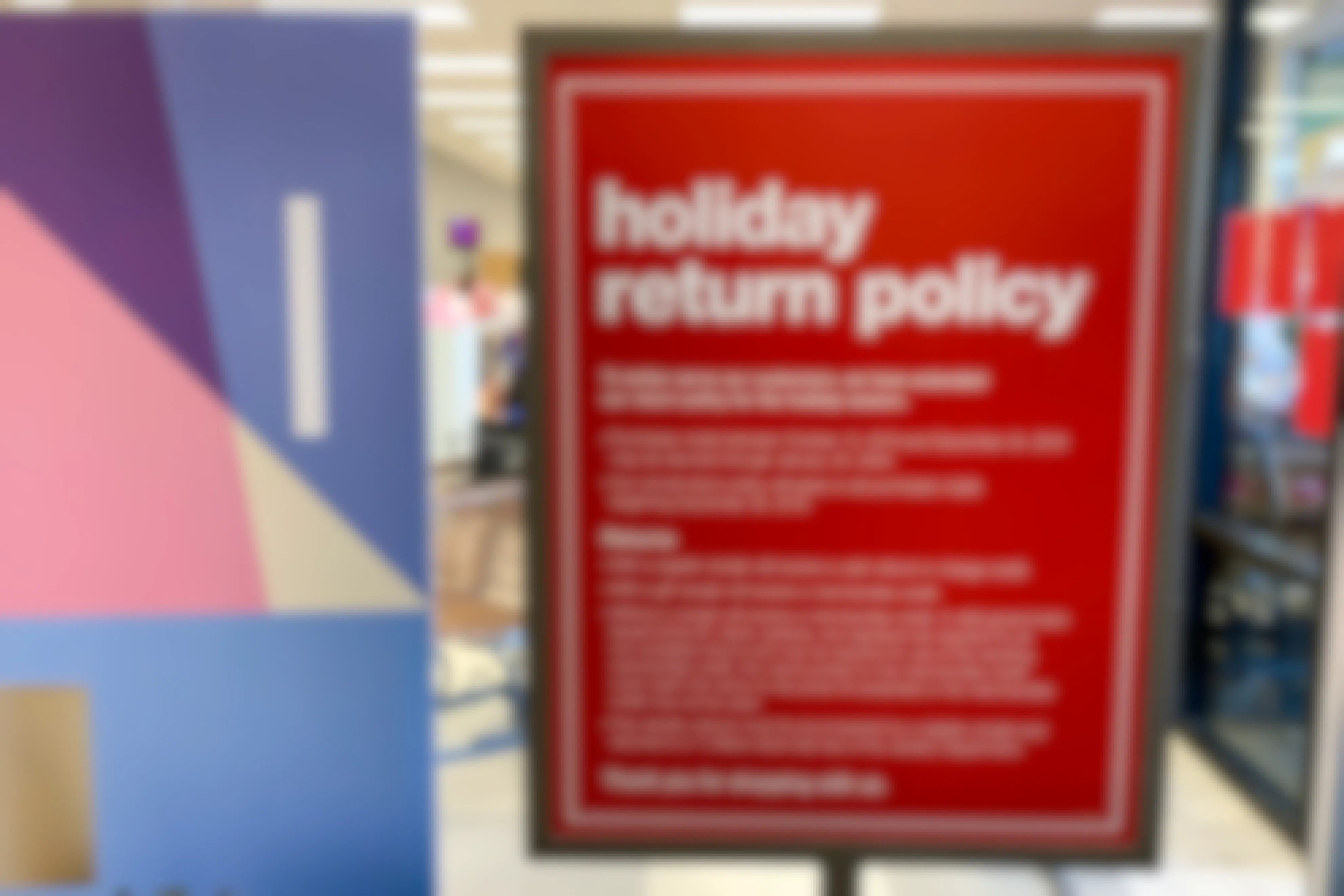 The holiday return policy sign at the front entrance.