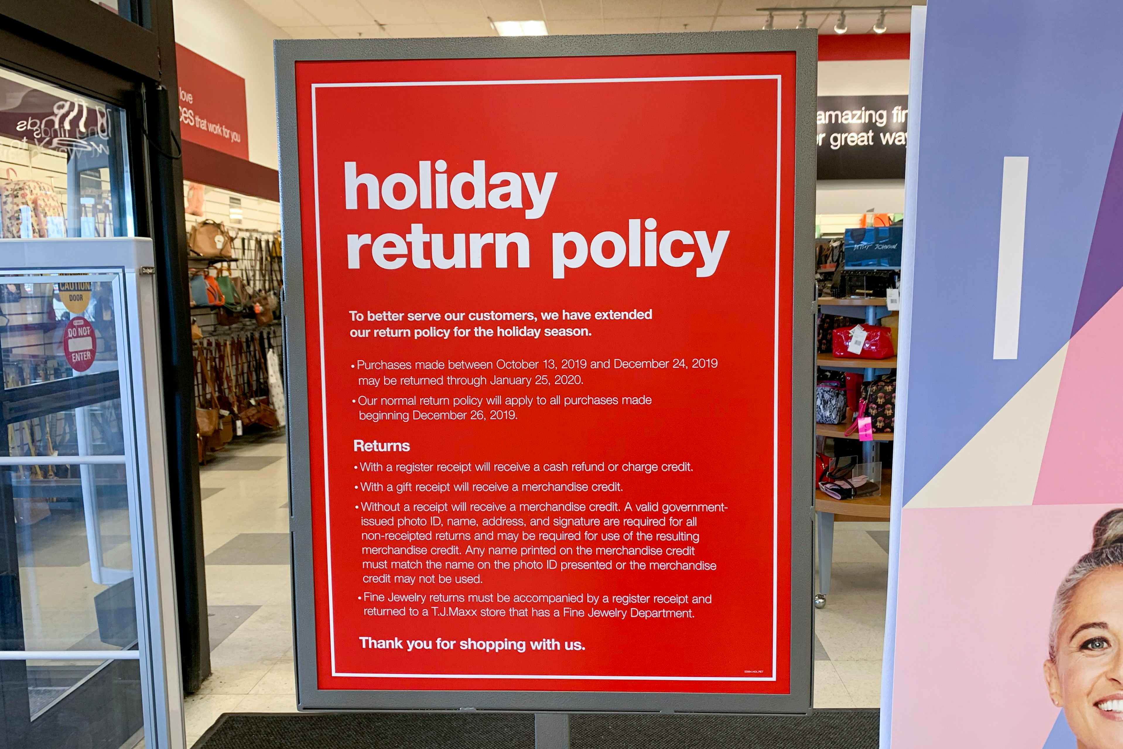 The holiday return policy sign at the front entrance.