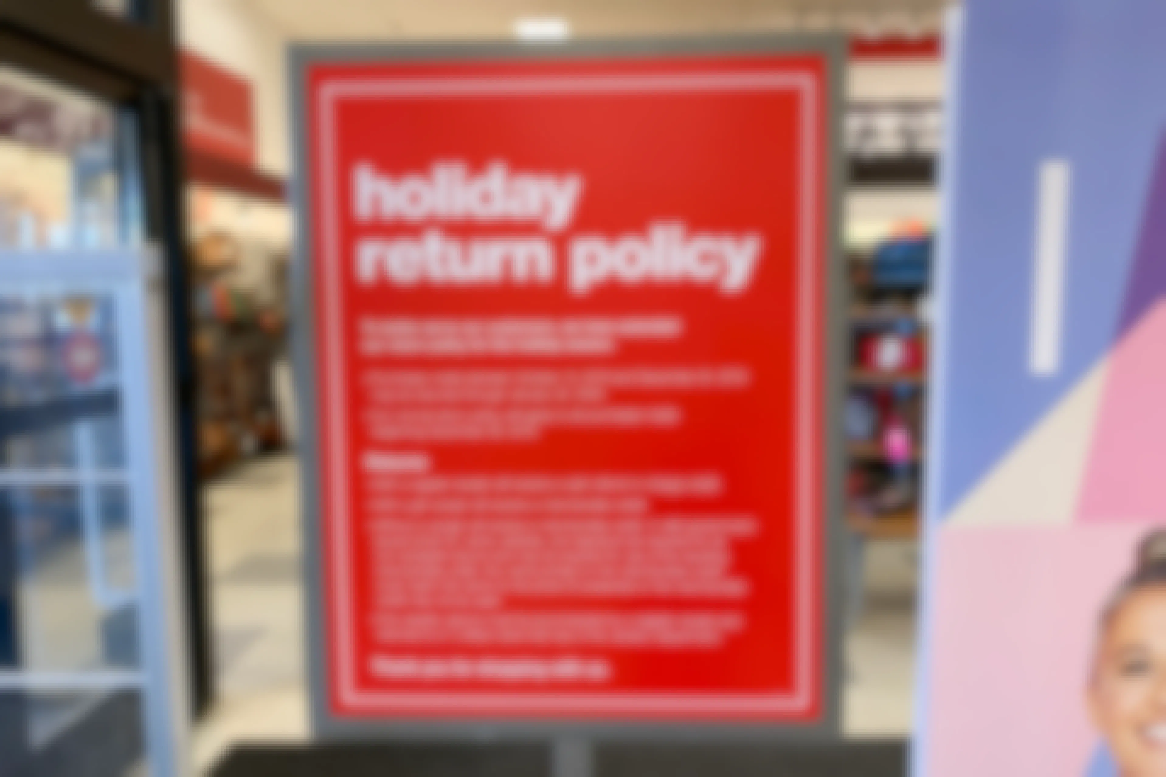 The holiday T.J.Maxx return policy sign at the front entrance.