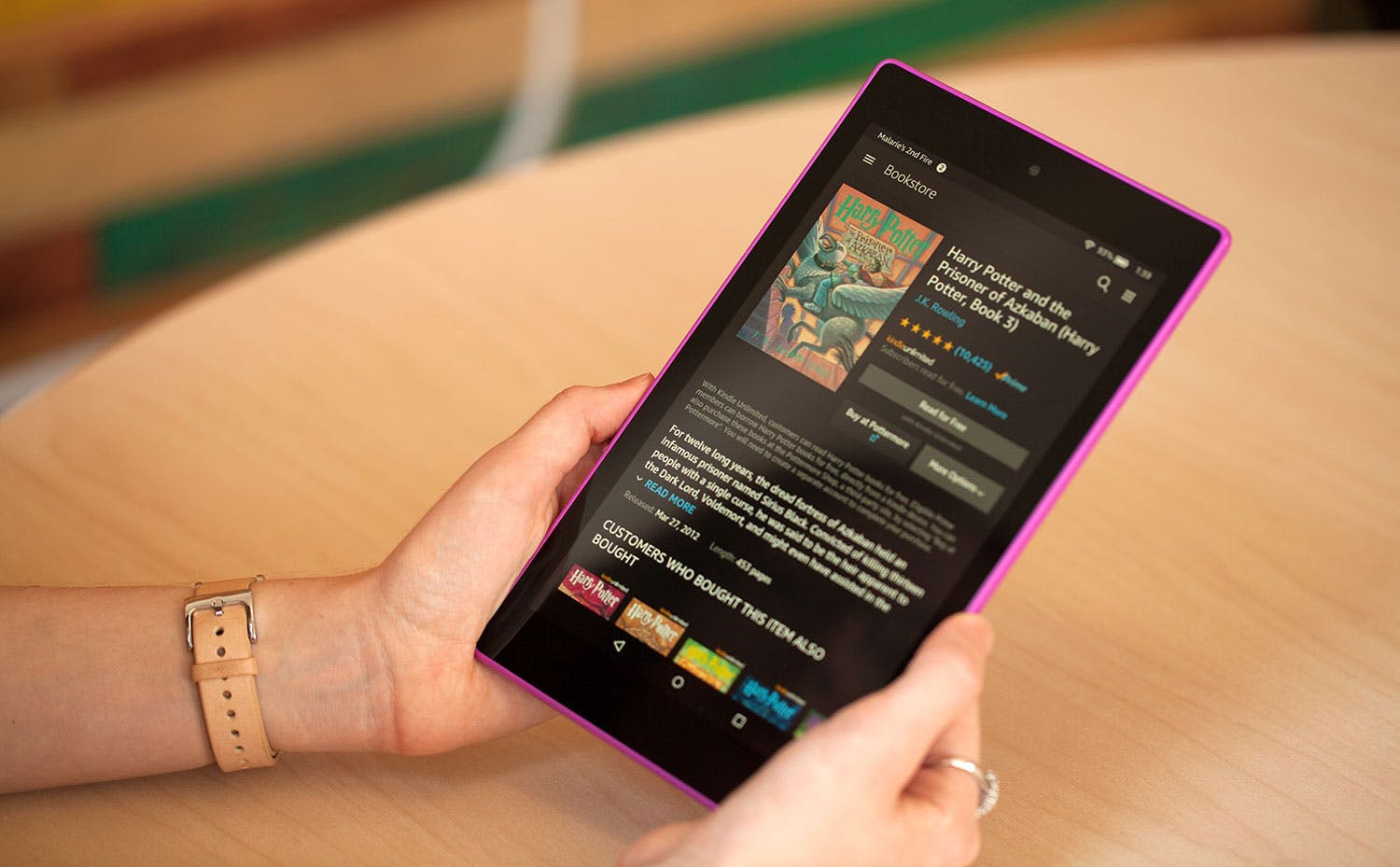A person holding an Amazon Fire HD.