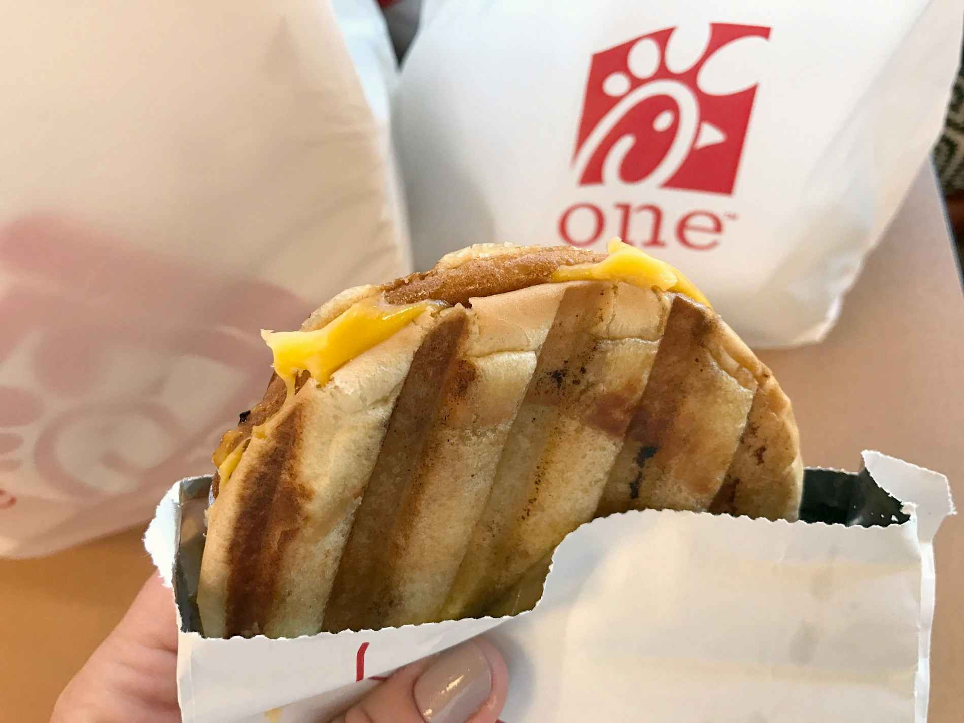 A close-up of a grilled cheese sandwich from Chick-fil-A.