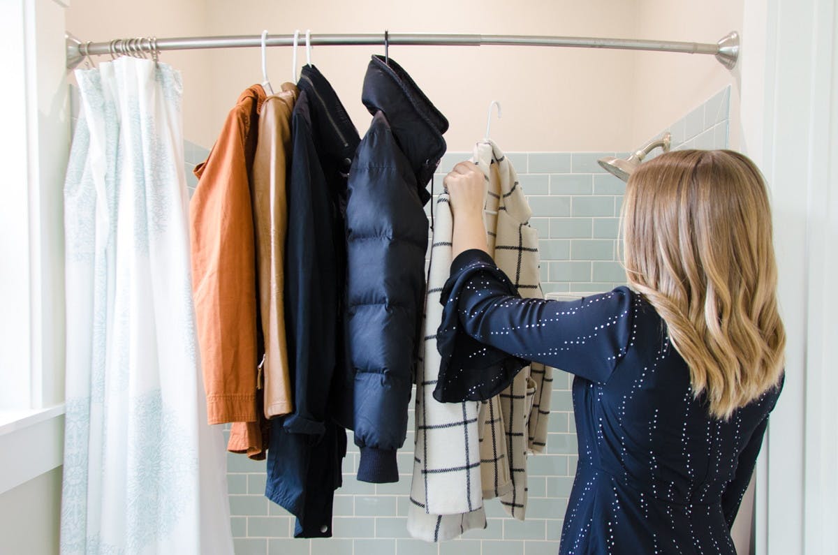 Turn a shower rod into coat check.