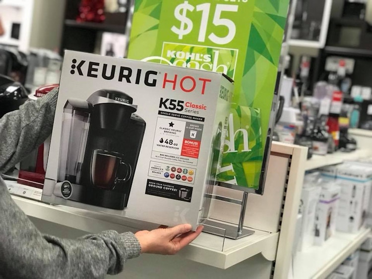 someone holding a Keurig at Kohls