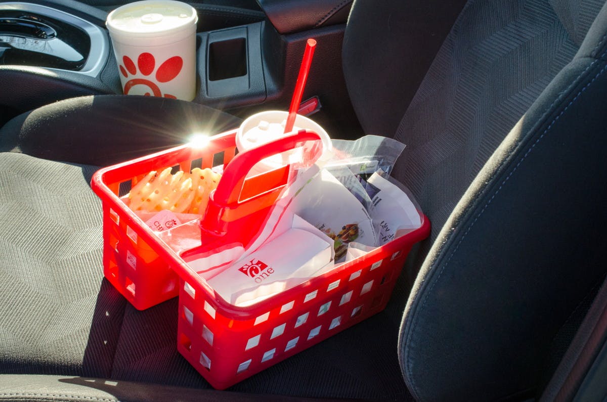  Use a dollar store caddy to serve meals and drinks on road trips.