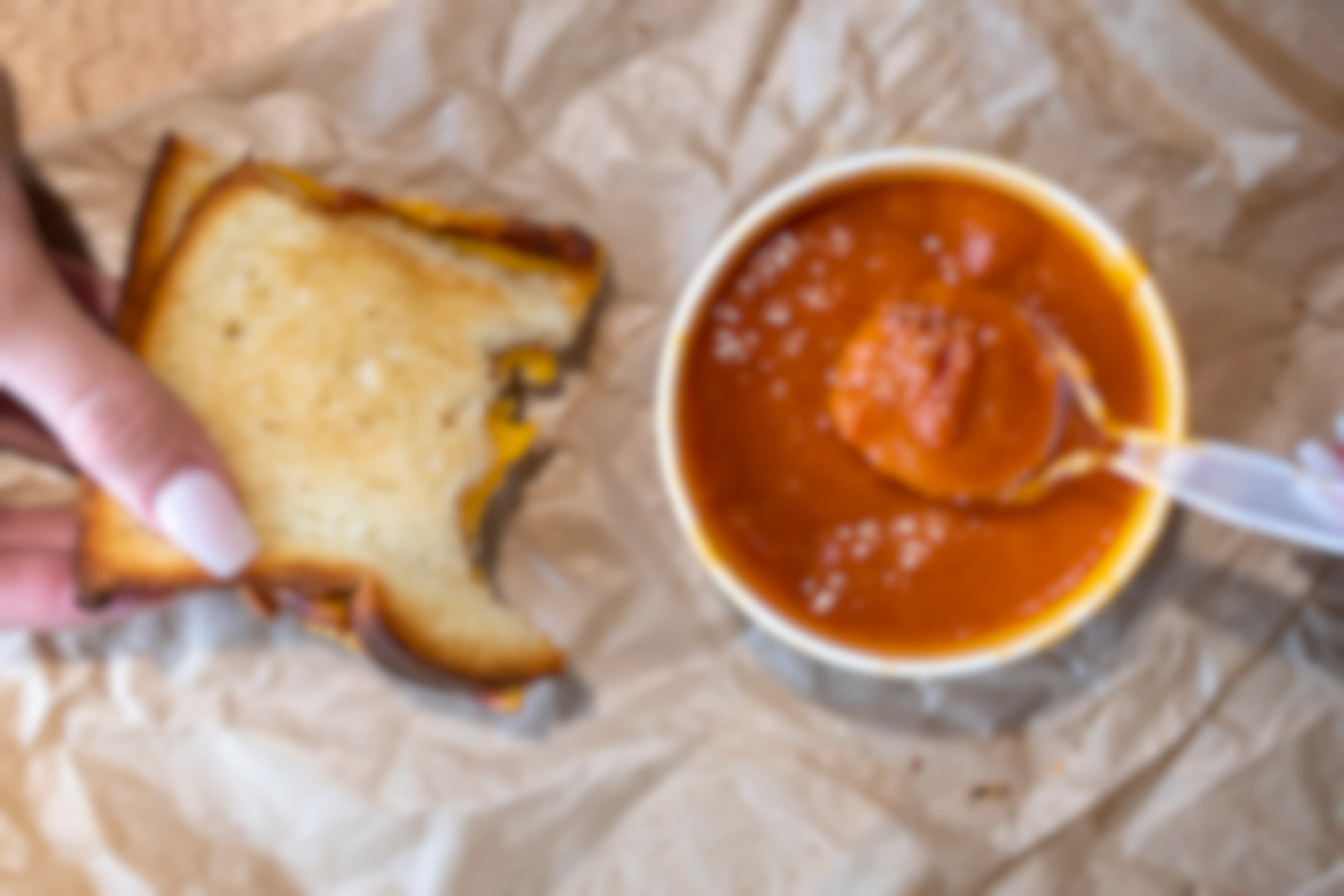 A grilled cheese sandwich and tomato soup
