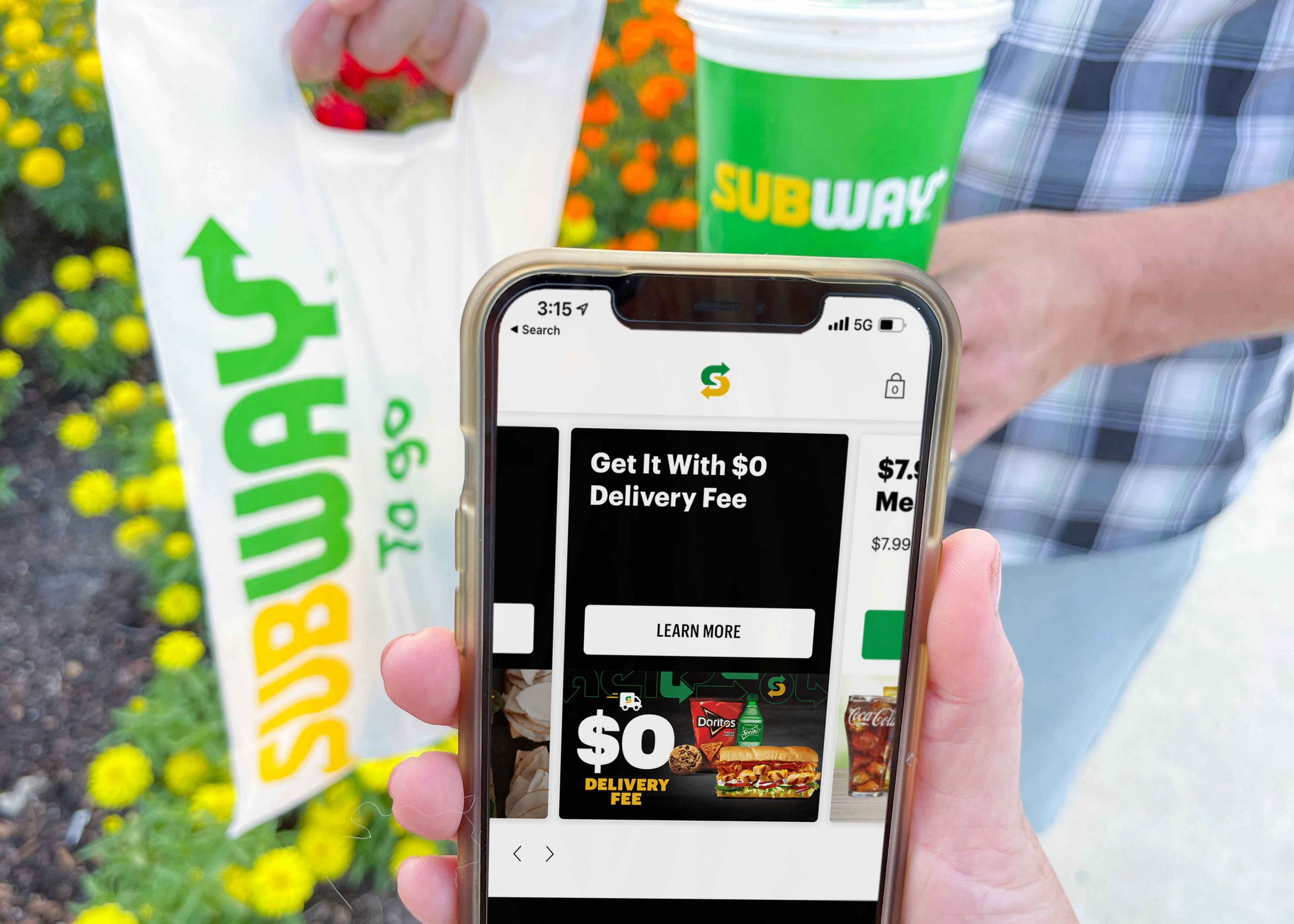 subway app with deals on cellphone next to subway bag