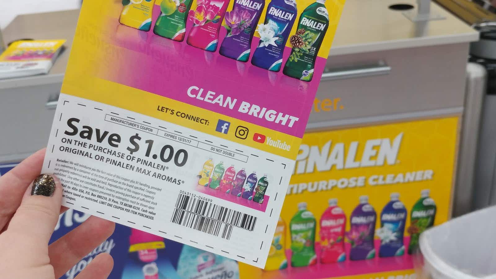 hand holding a Clean Bright save $1 coupon