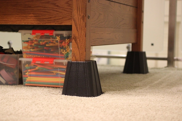 Elevate your bed for extra storage underneath. 
