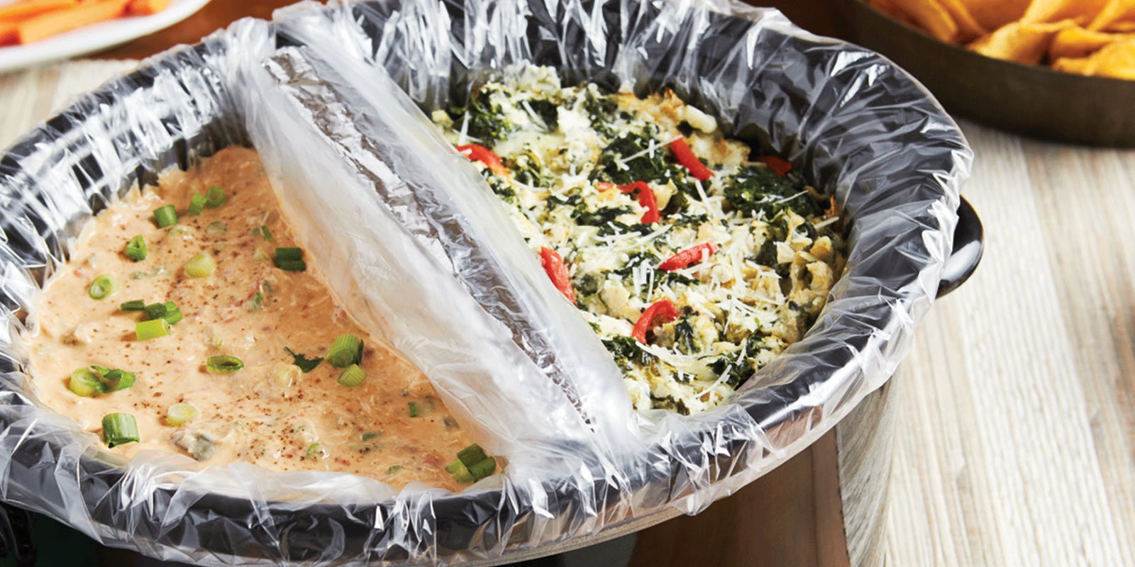 Use your Crock-Pot to cook two dips at once.