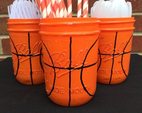 Repurpose Mason jars for silverware holders.