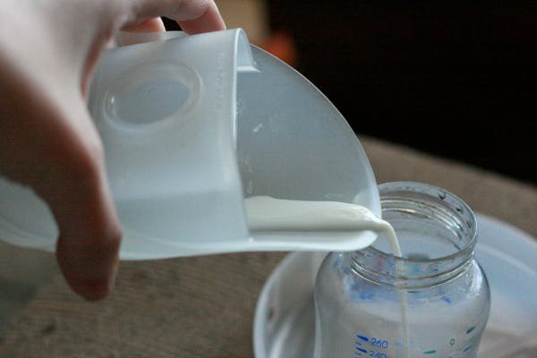 Use milk savers to catch any milk you release after feeding or pumping