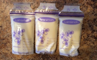 Freeze bags of milk flat on their side