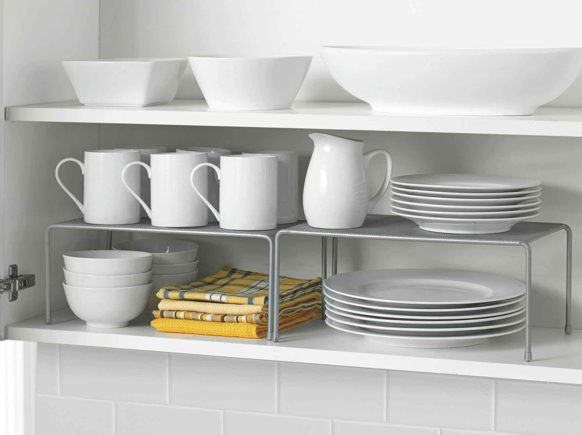 Use mesh shelves inside cabinets for extra storage.