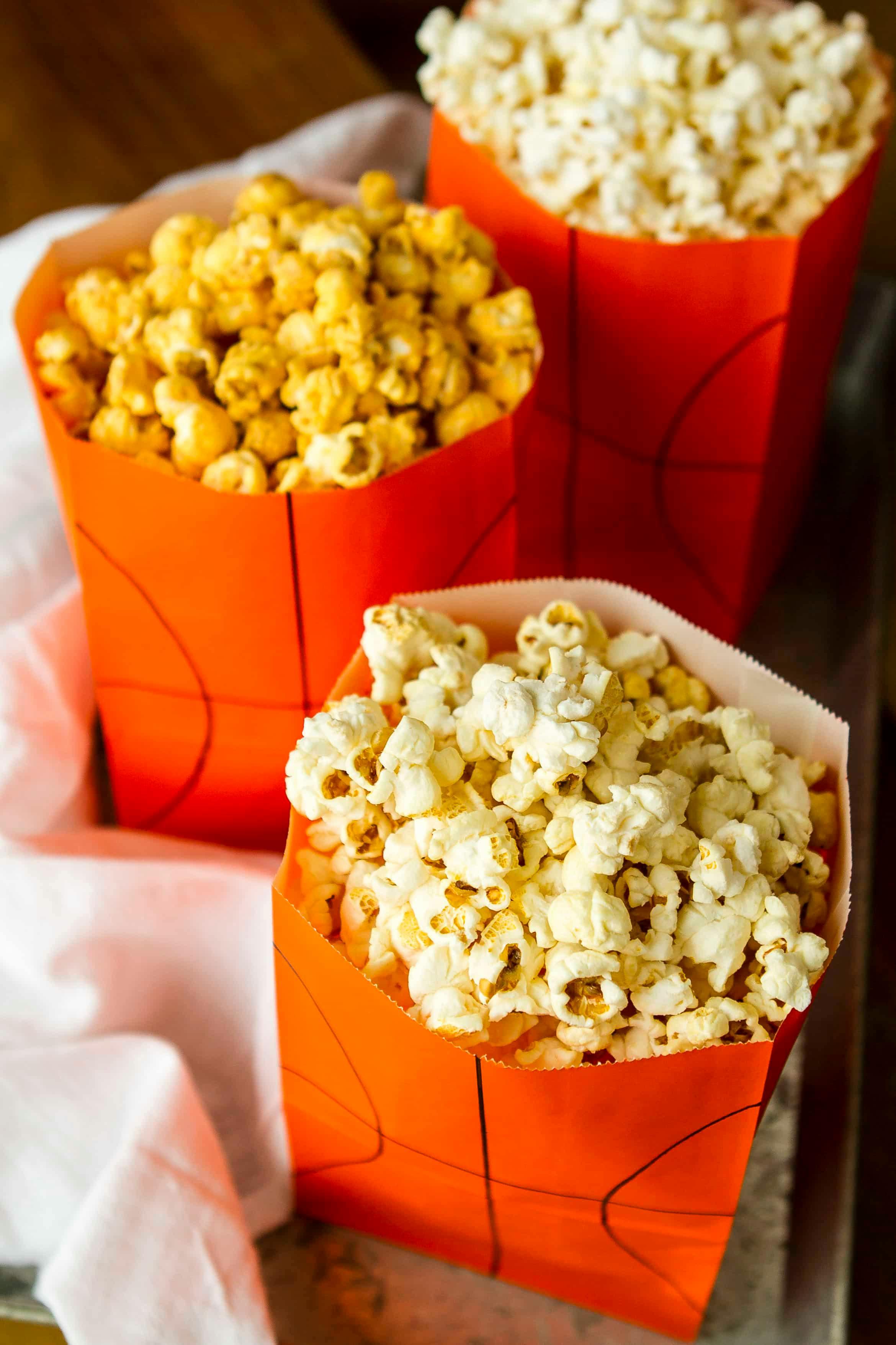 Get orange paper bags, a Sharpie, and fill with popcorn.
