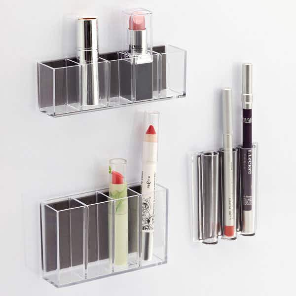 Use stick-on pods to store cosmetics.