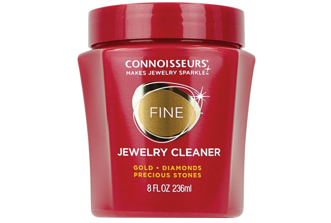 A red Connoisseurs jewelry cleaner bottle