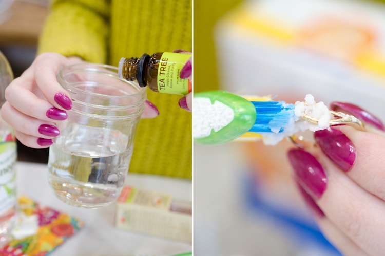 Person dropping tea tree oil into a jar with rings at the bottom