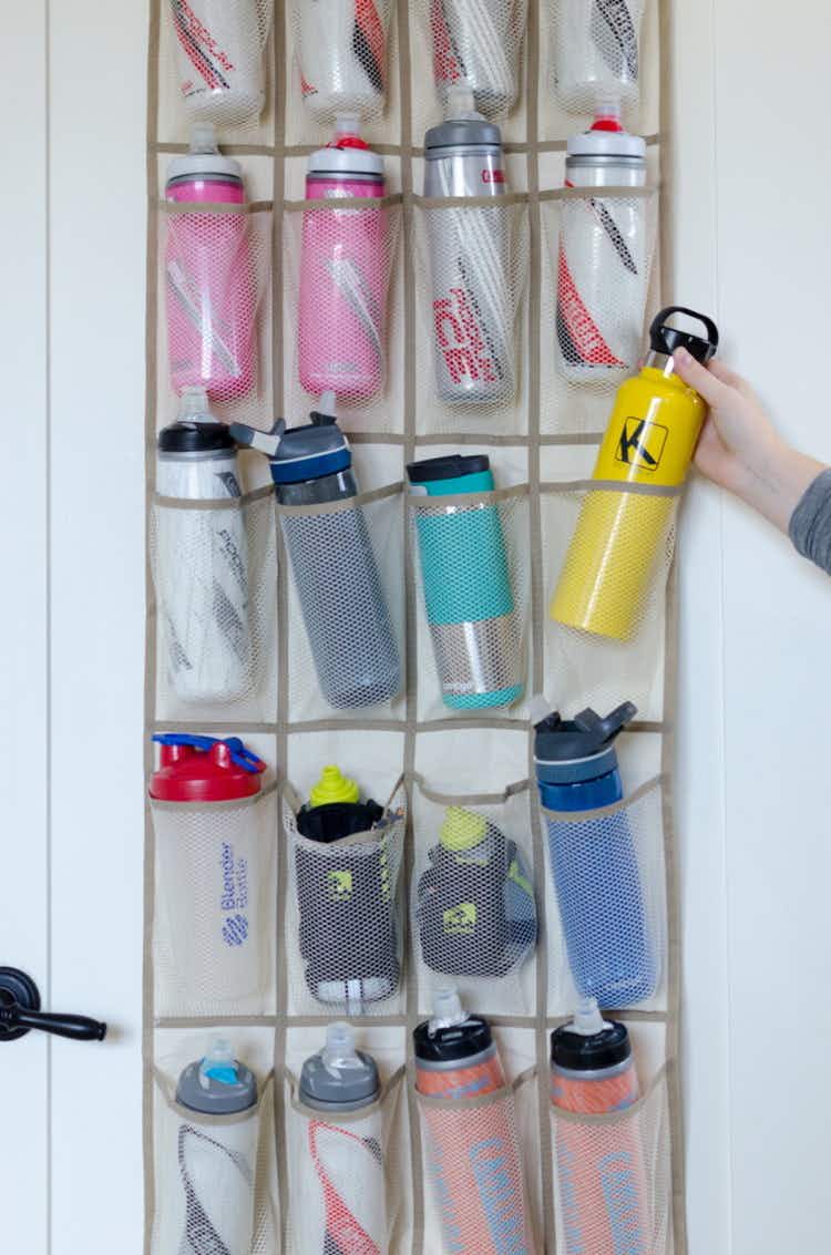 Use a shoe organizer in your pantry to store water bottles.