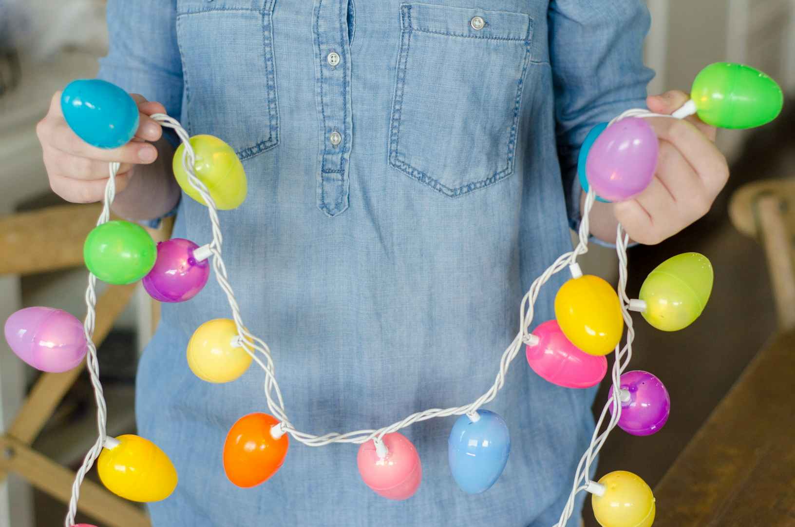 Attach plastic eggs to string lights.