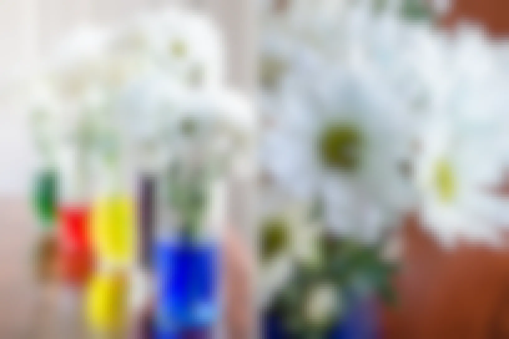 Use white flowers and food coloring for a fun centerpiece and springtime science experiment.