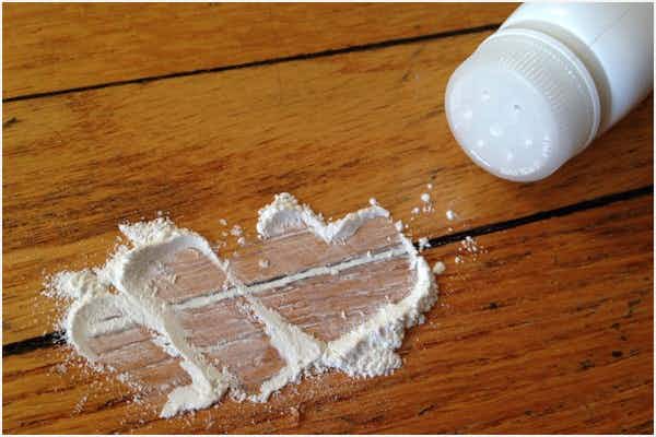 Fix a noisy hardwood floor by sweeping baby powder into gaps.