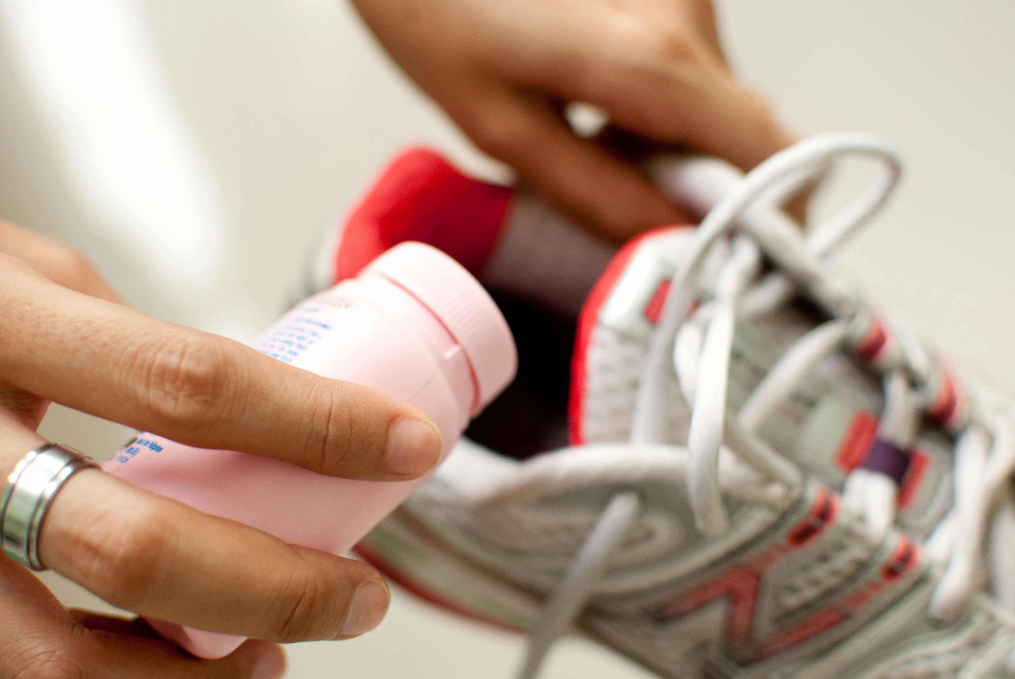 Fill your stinky gym shoes with baby powder and let set overnight.