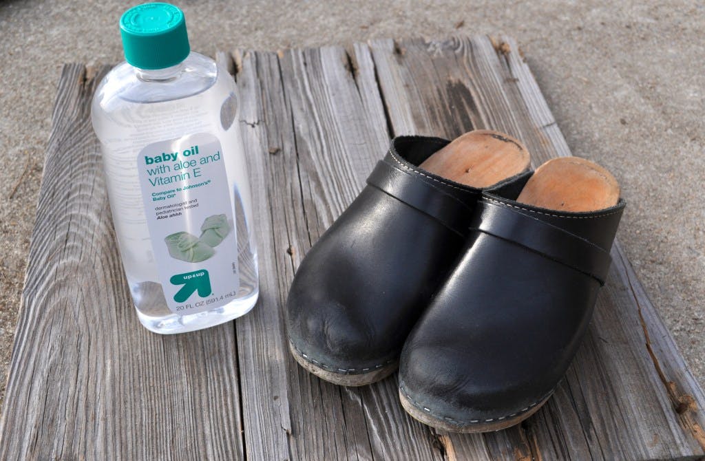 Use baby oil to buff leather purses and shoes.